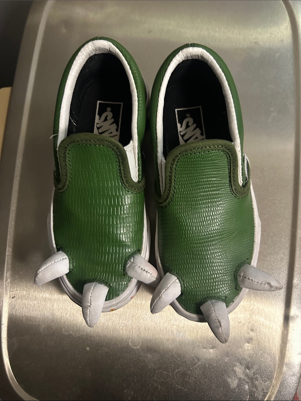 Vans Kids Green Slip-On Sneakers with Dinosaur Claw Accents